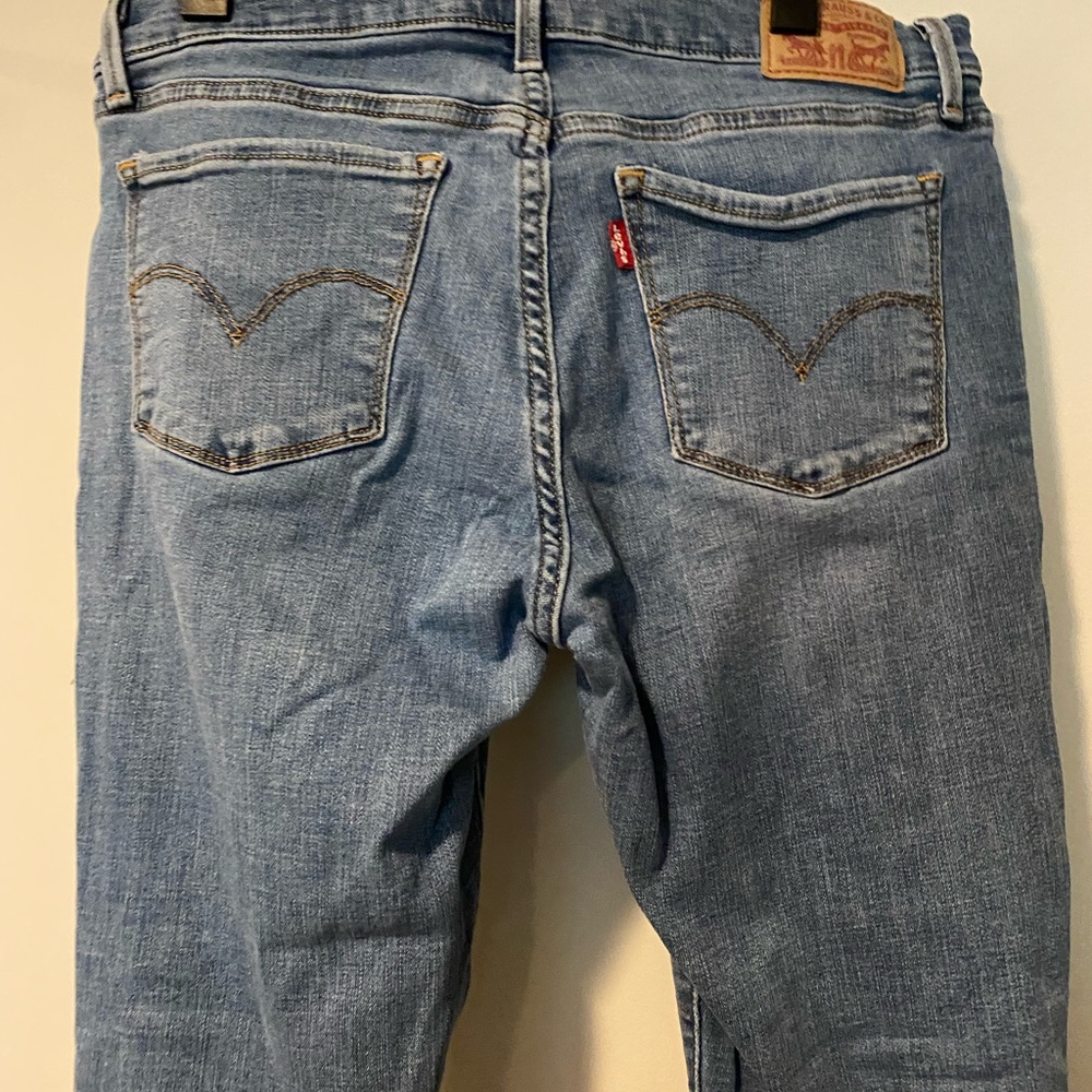 Levis 710 super skinny Ripped High Waisted jeans